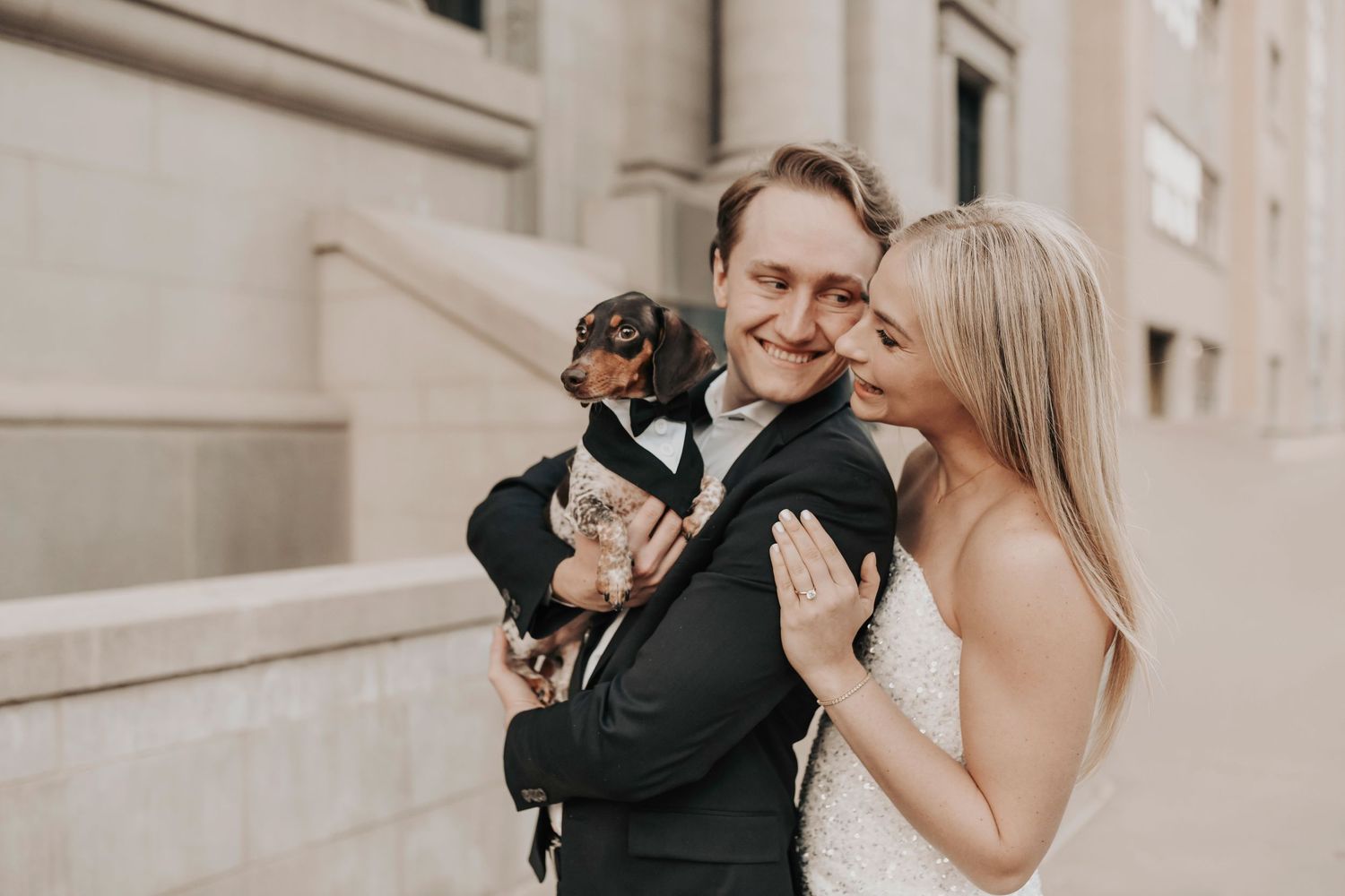 Stylish Dallas engagement photos featuring couple walking their dog in the city