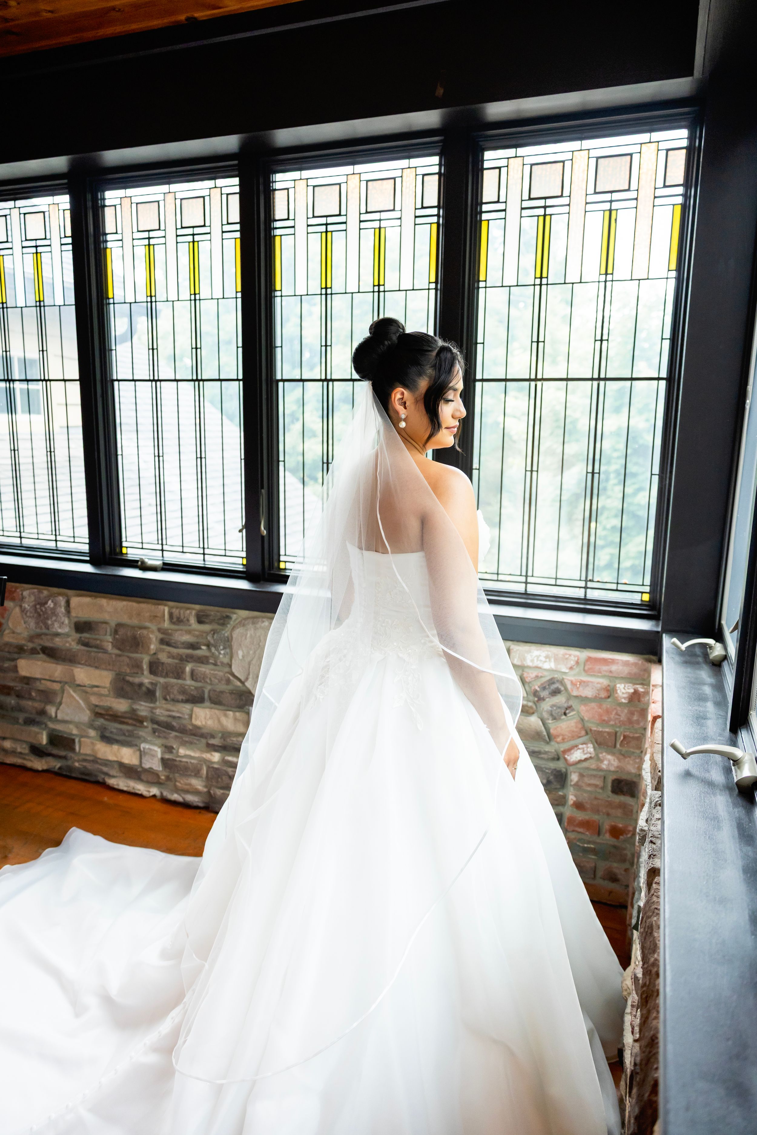 A bride in a flowing white wedding gown - Sussex County wedding photographer