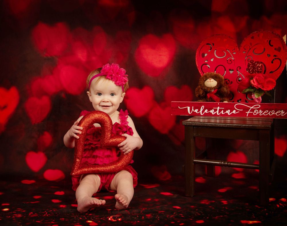 A Valentine's Day themed photo series with red heart bokeh lights and romantic holiday decorations.