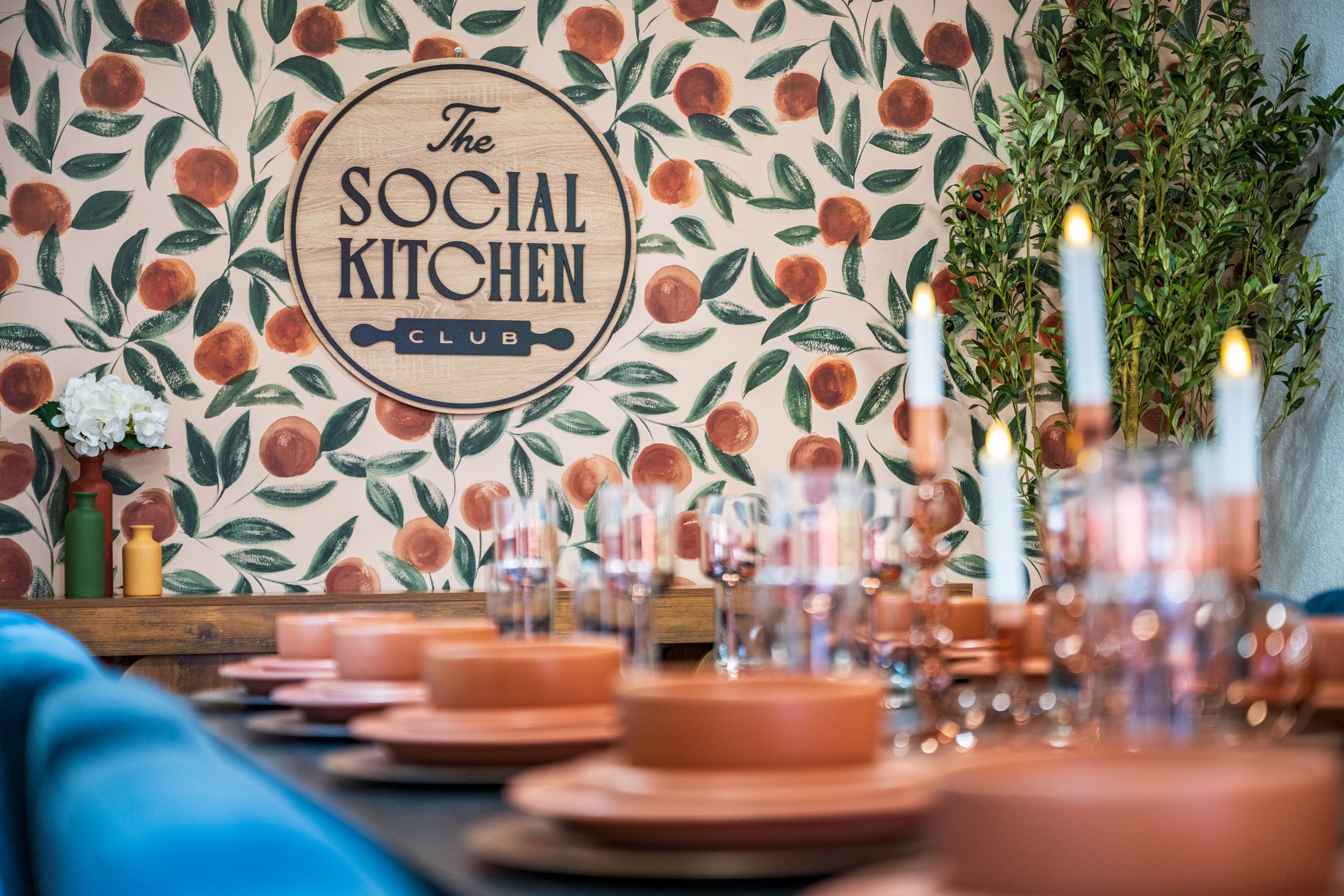 The dining room set and the Social Kitchen Club sign at a short term rental & AirBnb property, the Social Kitchen Club in Arvada, CO.