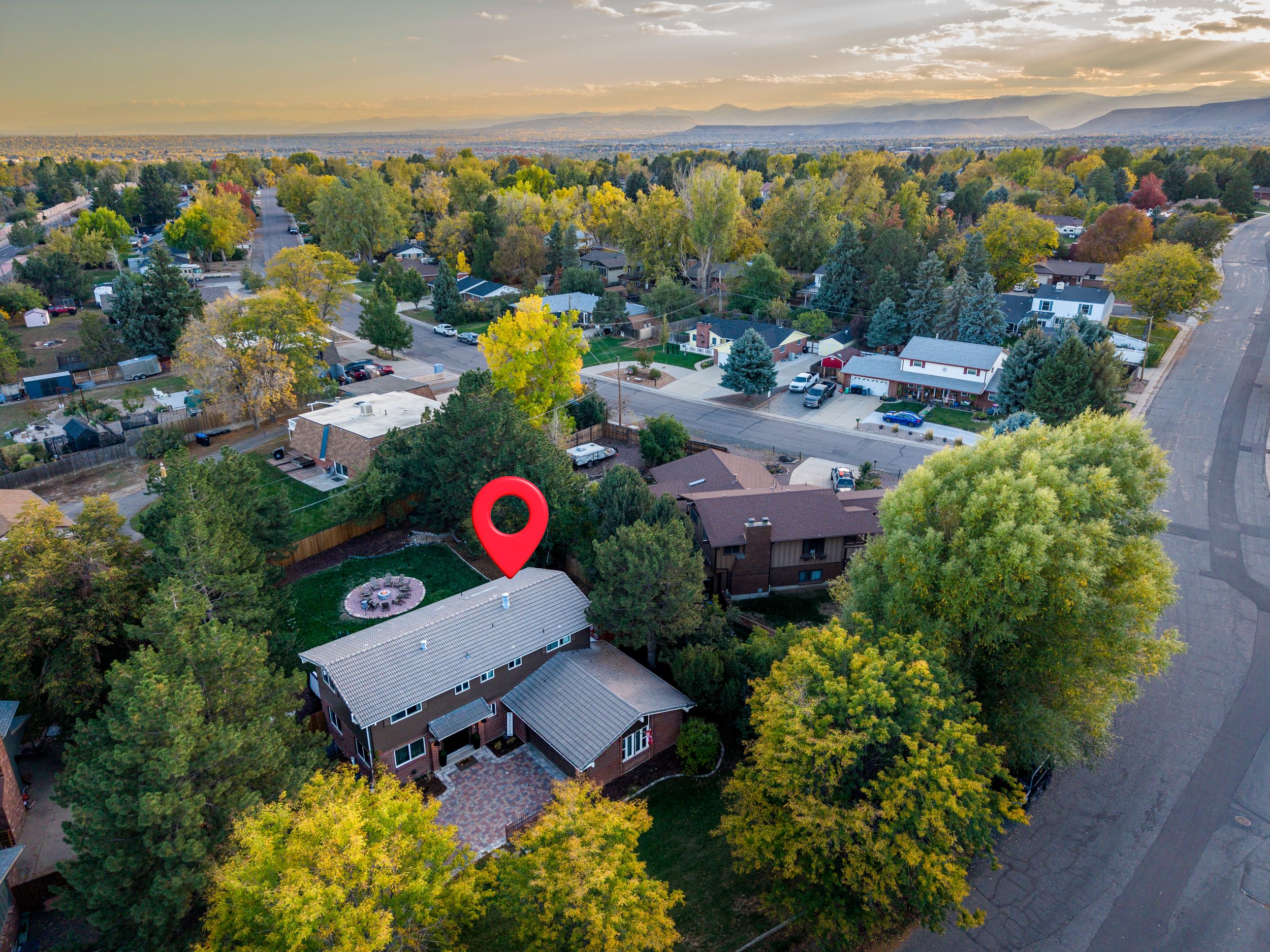 Aerial/drone view of the property and neighborhood at a short term rental & AirBnb property, the Social Kitchen Club in Arvada, CO.