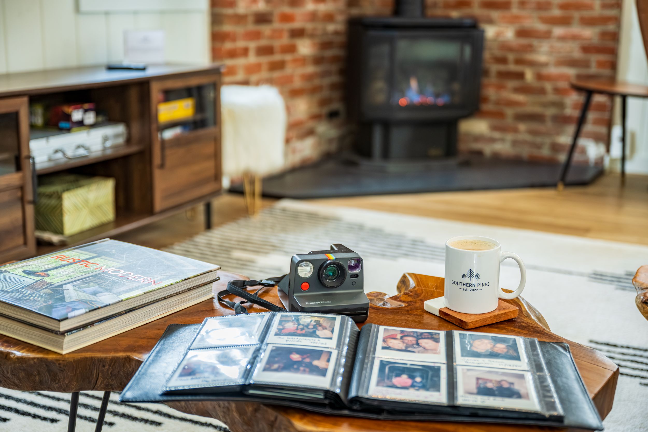 Detail shot of a polaroid camera in Southern Pines Cabin by Denver Hospitality, Travel & Tourism photographer Captain Colorado Photography.