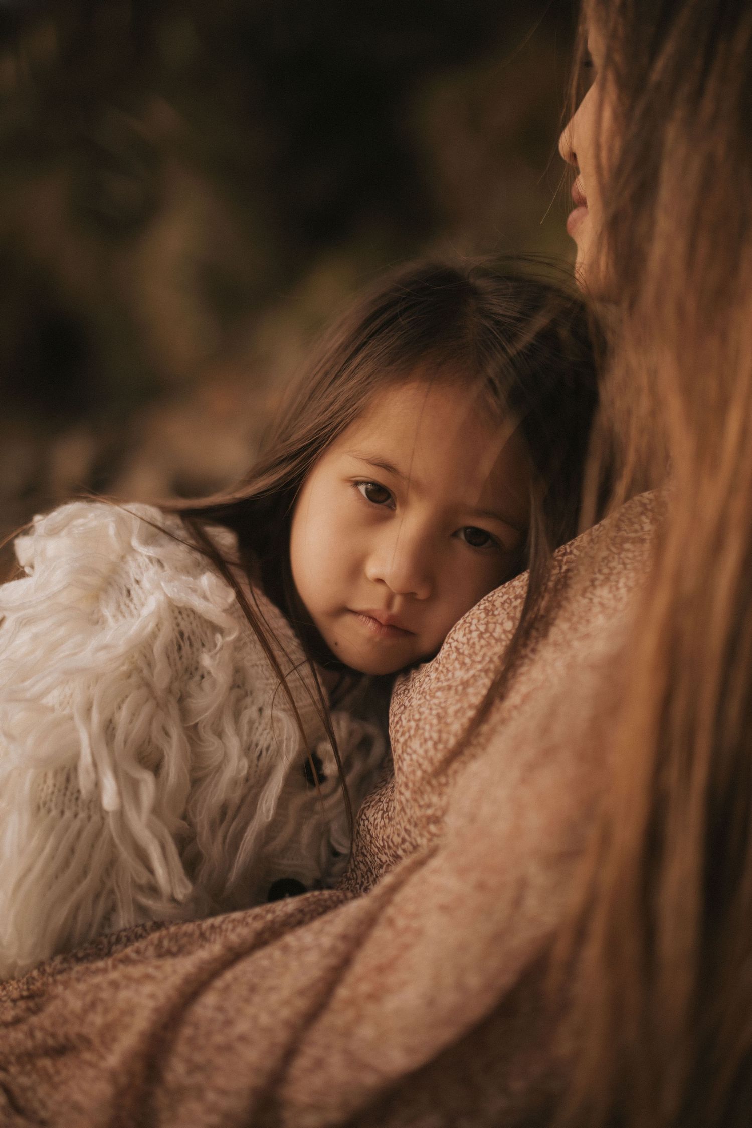 Motherhood portrait photographer in Raglan NZ offering natural, emotive photography for mothers and families in New Zealand.