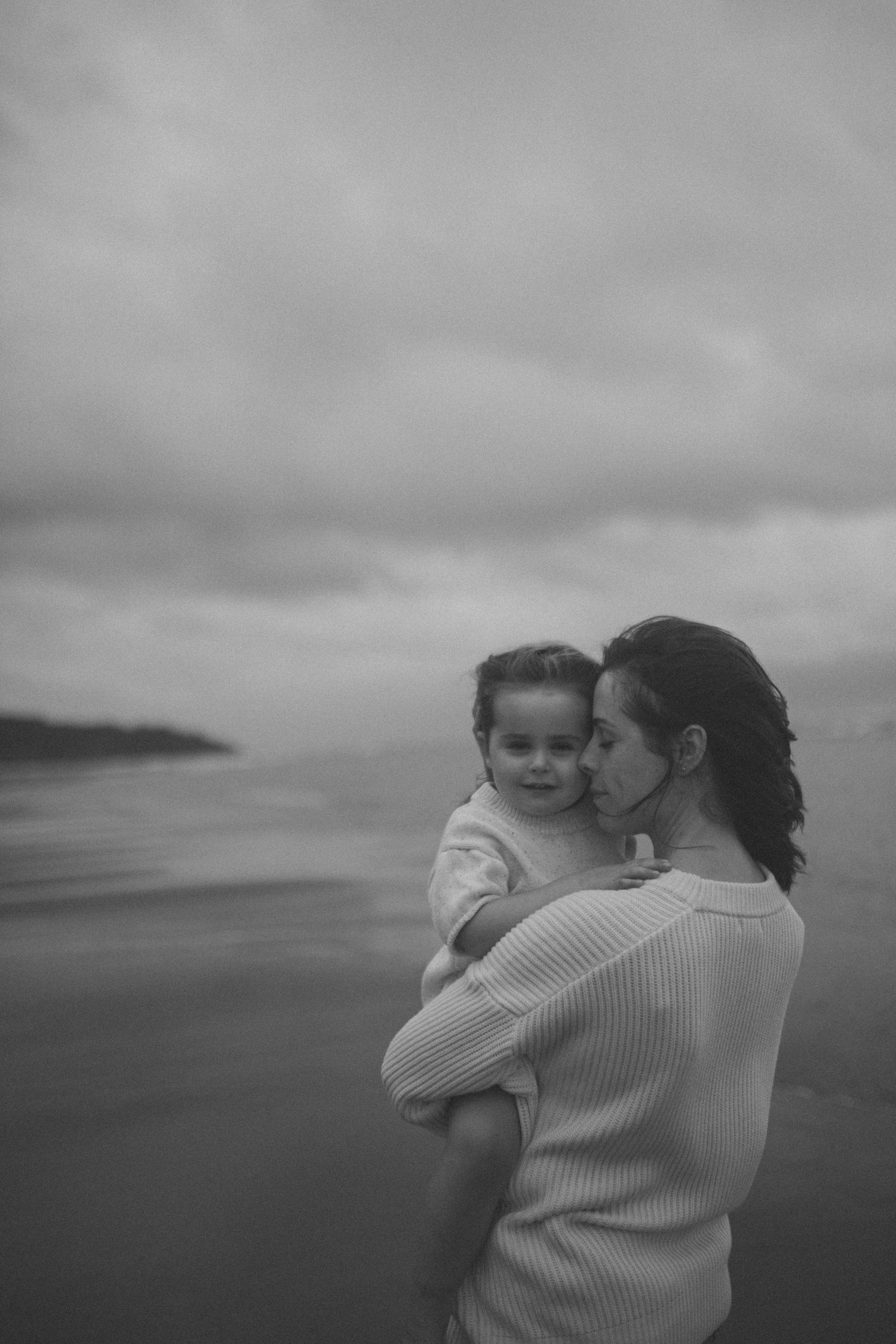 Motherhood portrait photographer in Raglan NZ offering natural, emotive photography for mothers and families in New Zealand.