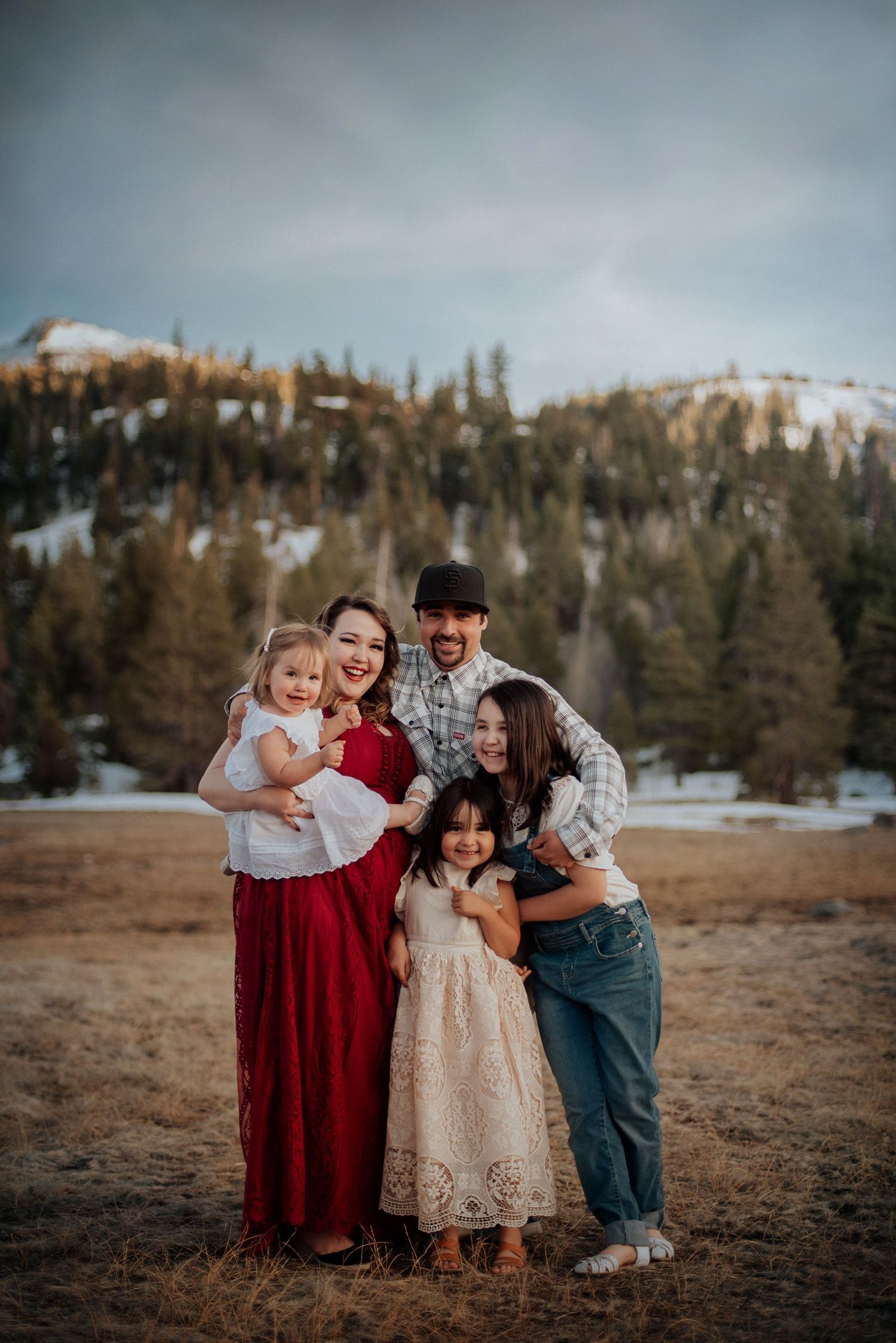 Lake Tahoe family photography – joyful family portrait in a scenic mountain setting by a Lake Tahoe photographer.