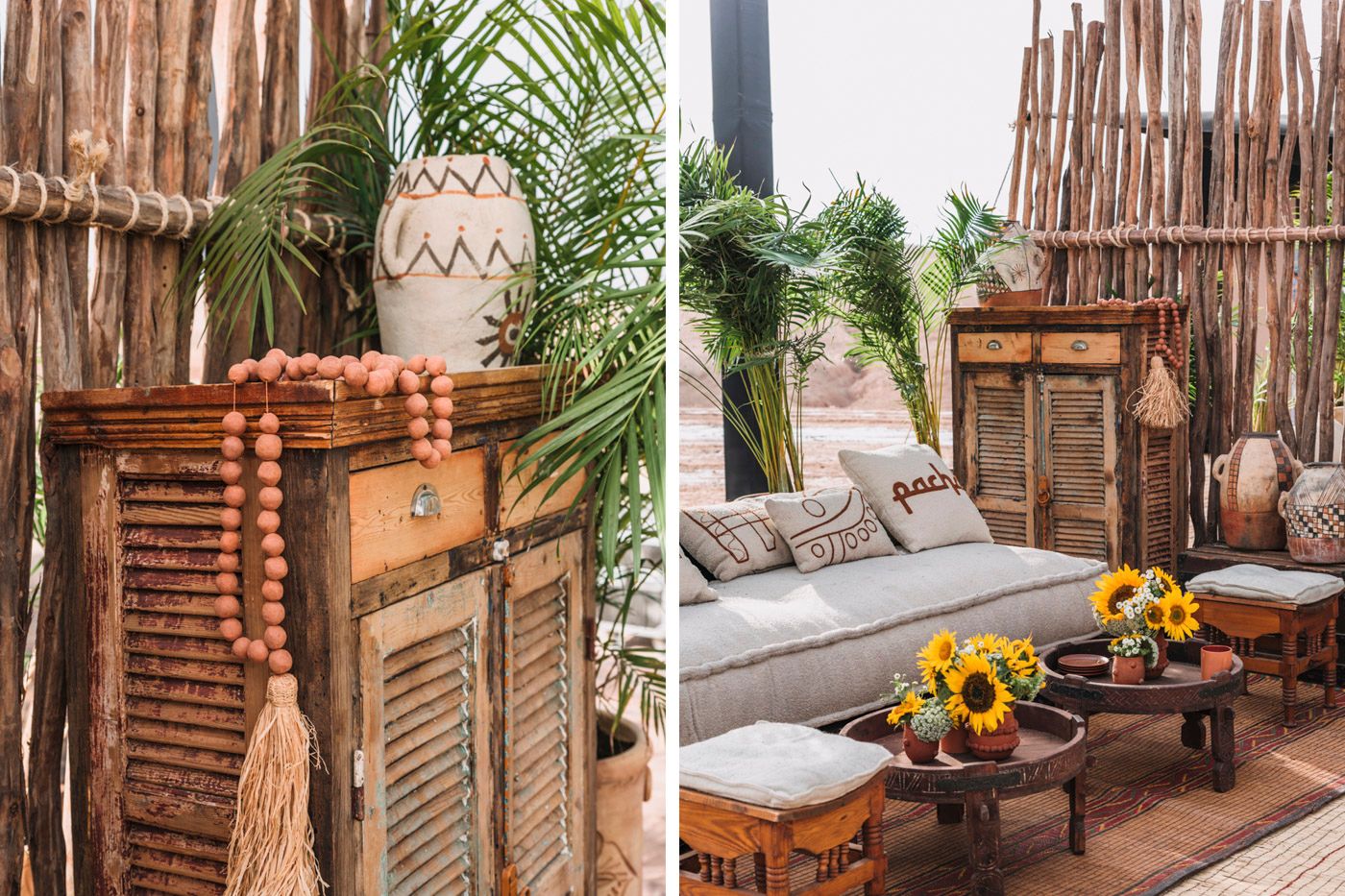 Rustic outdoor patio with bamboo walls, white cushioned seating, wooden furniture and decorative sunflowers.