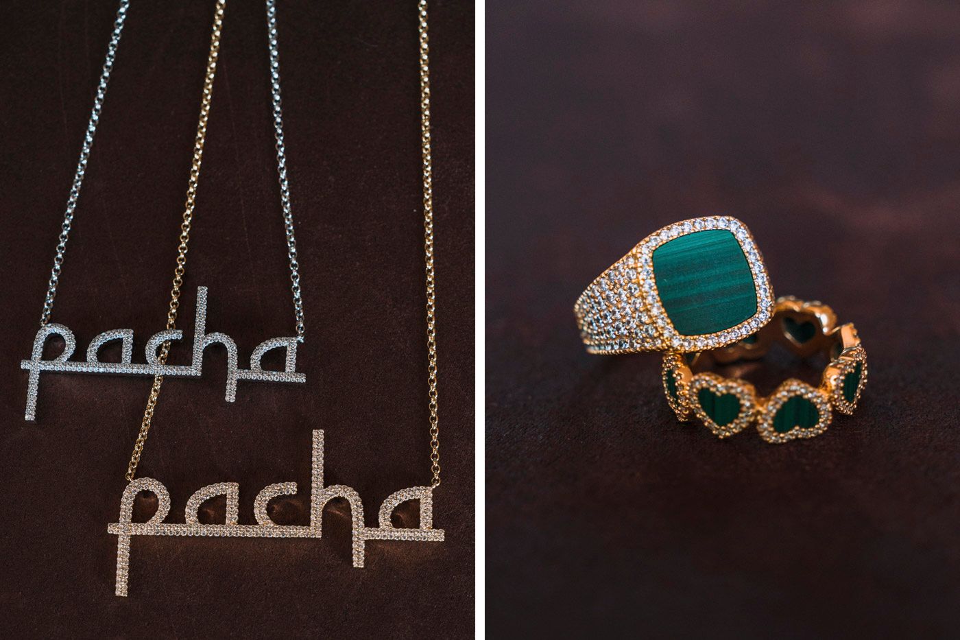 Two silver name necklaces with 'pacha' text alongside turquoise and gold statement rings on dark background.