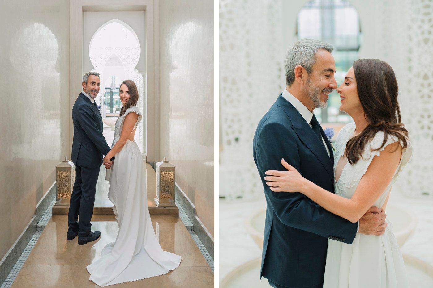Two people pose for elegant wedding photos in a bright white architectural space with arched doorways.