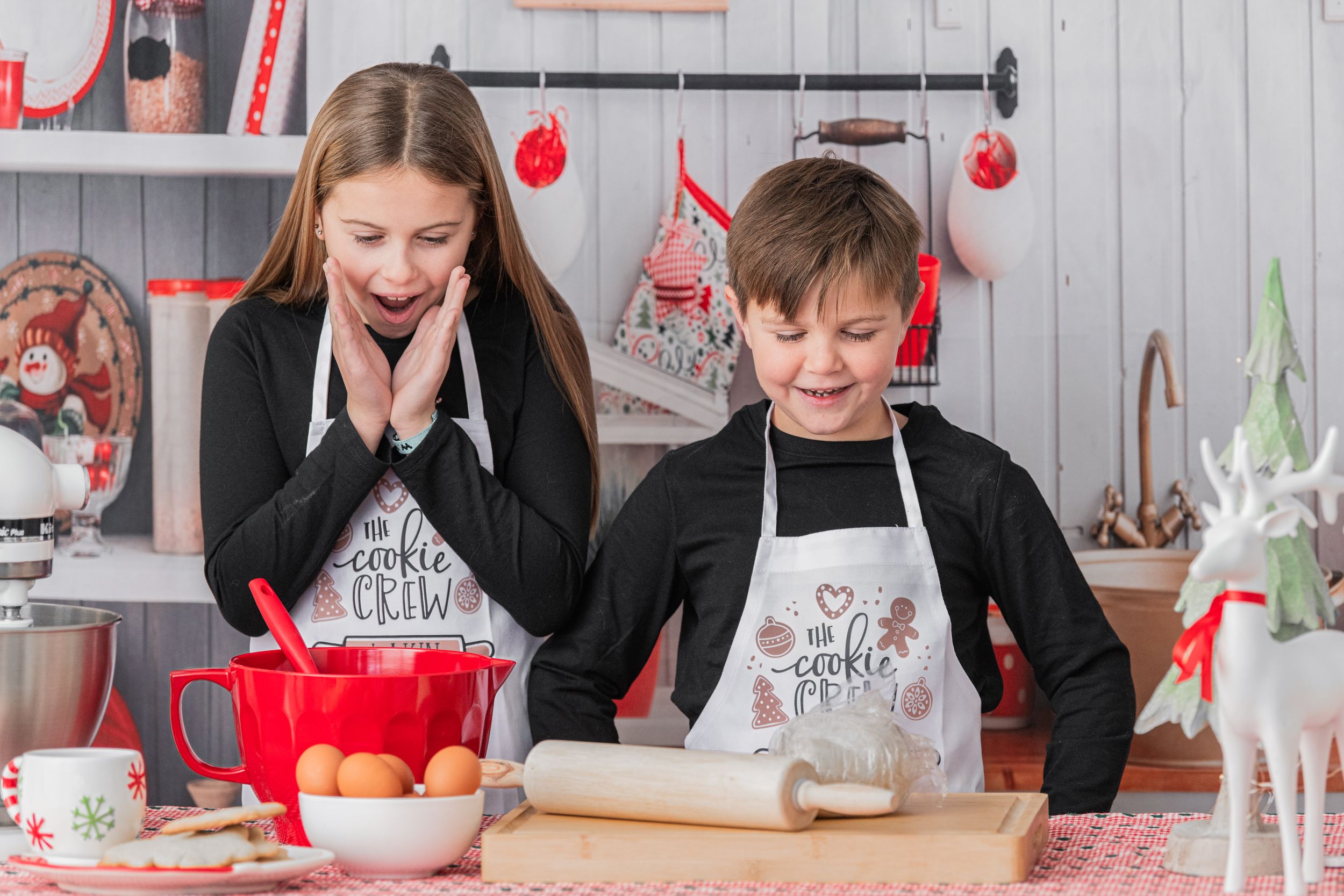 Cookie crew – siblings enjoying a fun baking session in the studio kitchen, making sweet memories together.