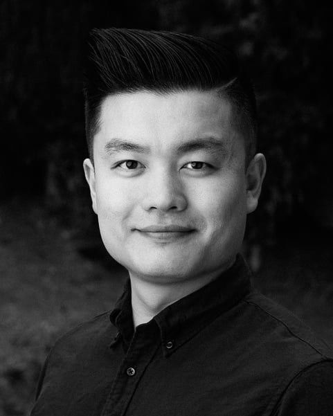 Professional black and white headshot of Khoi Ly, interior and architectural photographer based in San Diego.