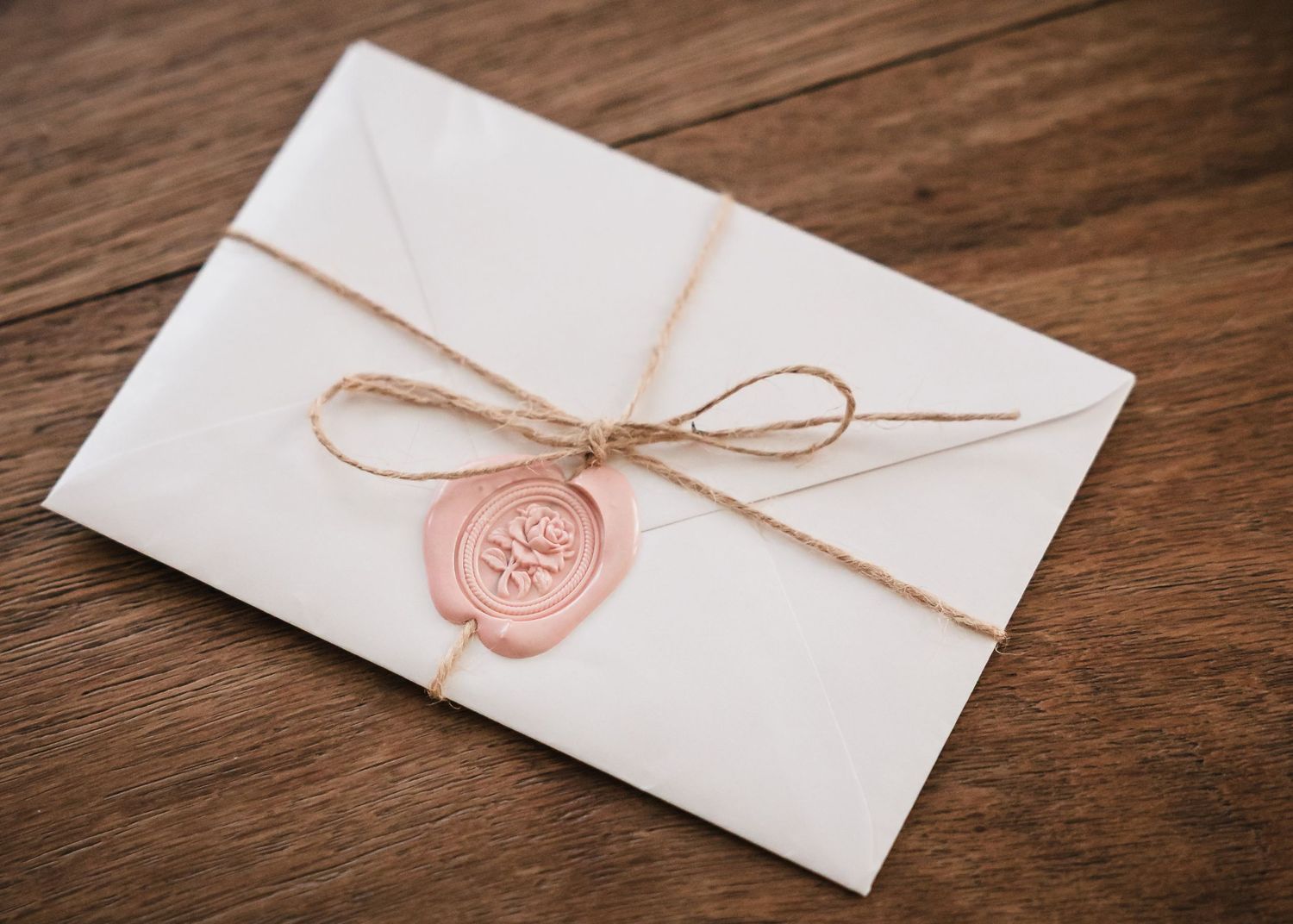 Wedding invitation with wax seal detail photographed at Briar Barn Inn wedding Massachusetts