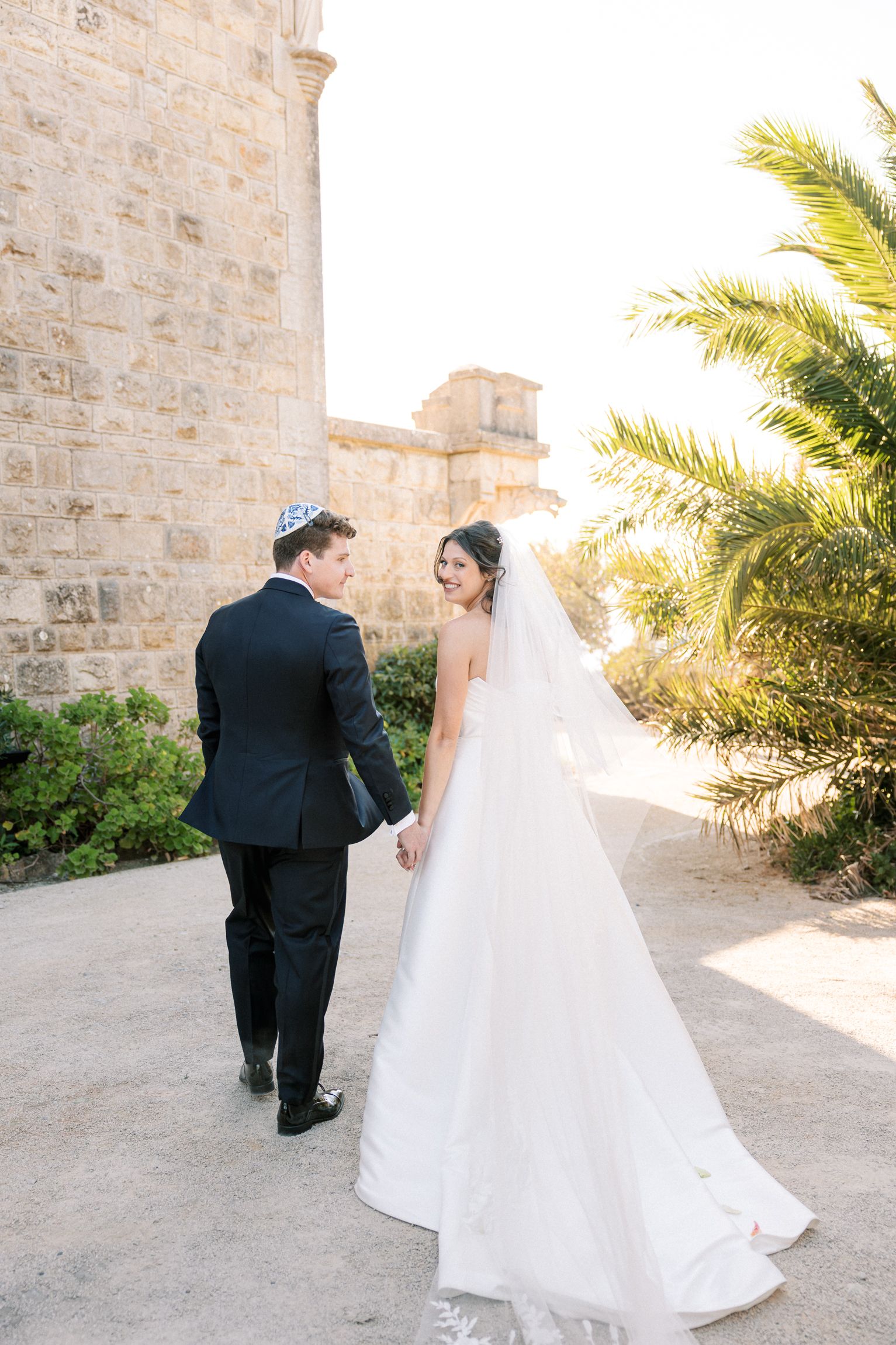 Bride and groom portraits by Lisbon wedding photographer at seaside venue in Cascais Portugal