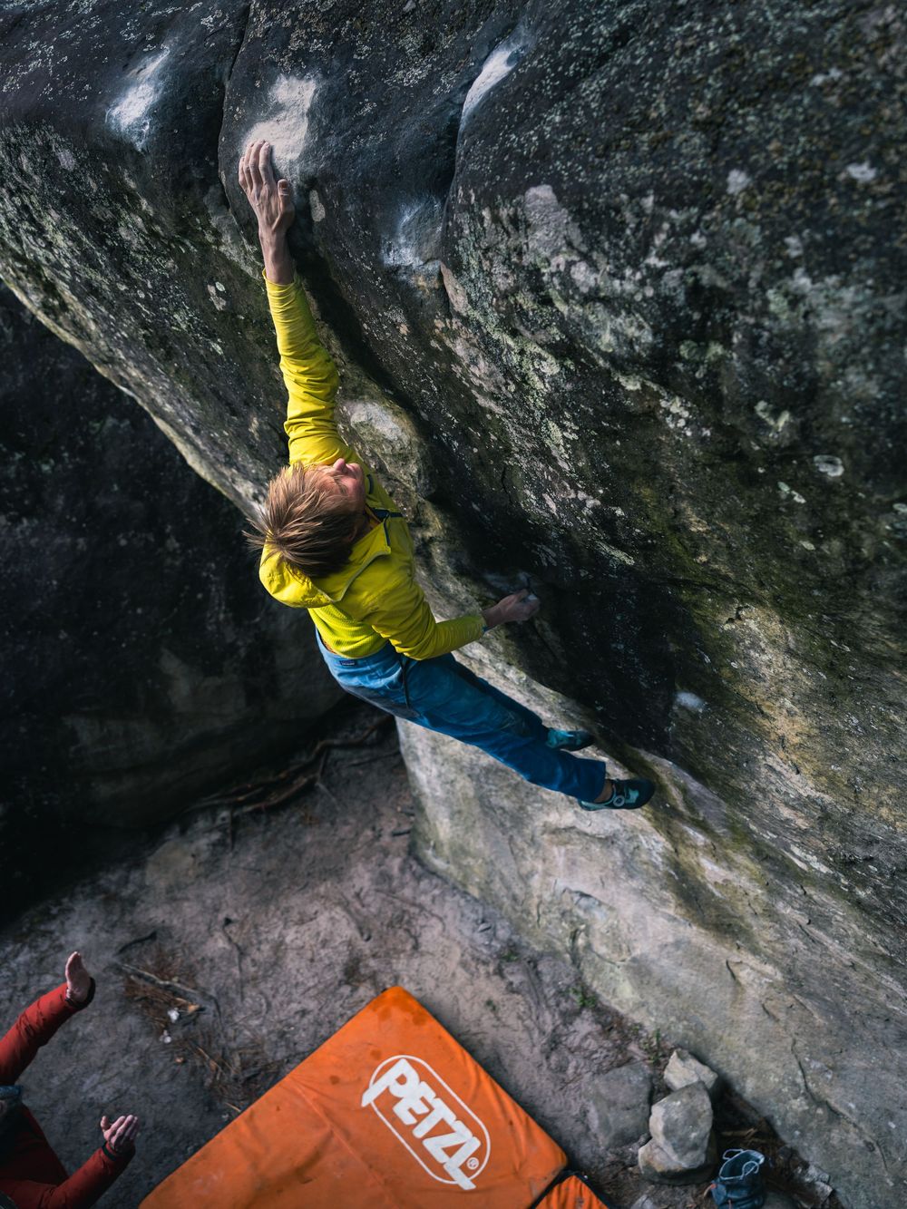 Alexander Megos bouldering on Fontainebleau sandstone, Tenaya Aruma campaign. Photography by Jan Virt, France 2026.