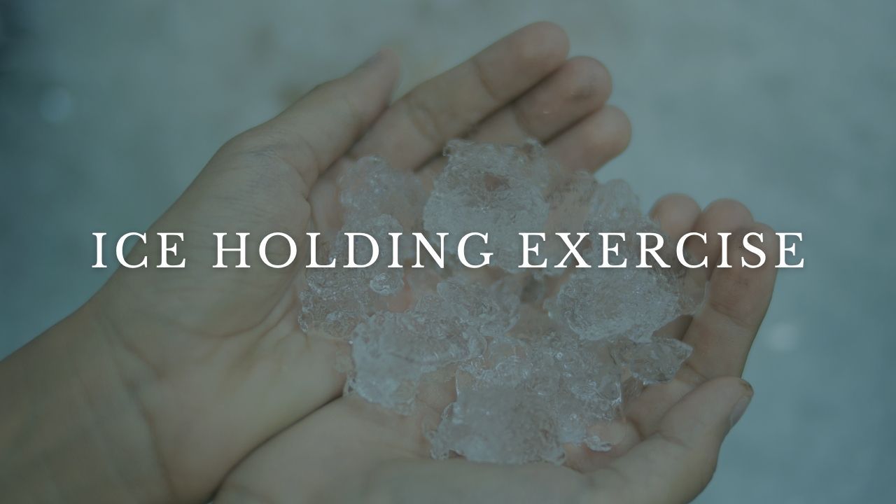 Close-up of hands holding melting ice cubes during an ice holding exercise demonstration.