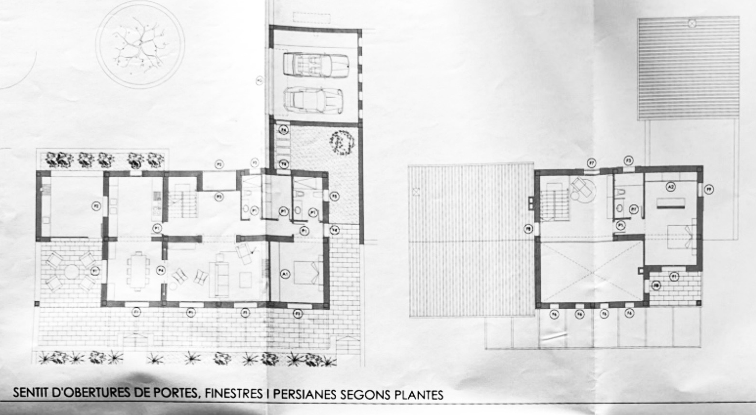 Architectural floor plan drawing showing detailed layout of a residential building with room divisions and door/window schedules.