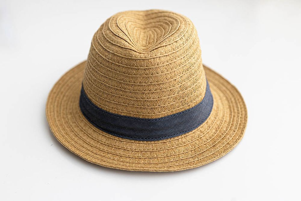 Baby boys tan straw fedora hat with navy blue band for kids.