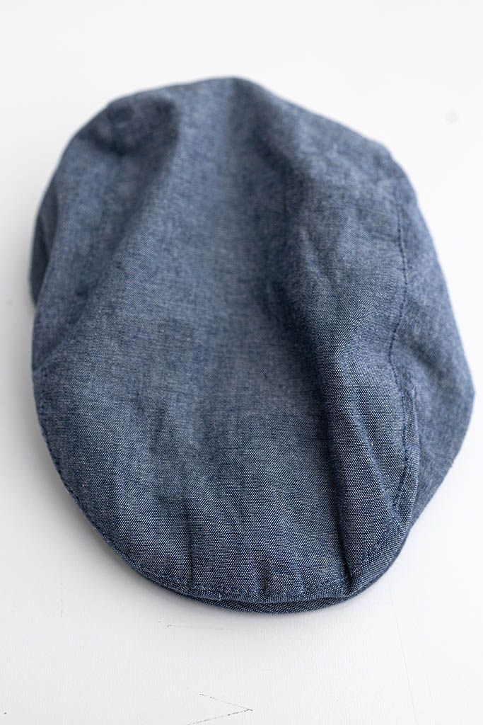 Baby's newsboy cap for photoshoot outfit.