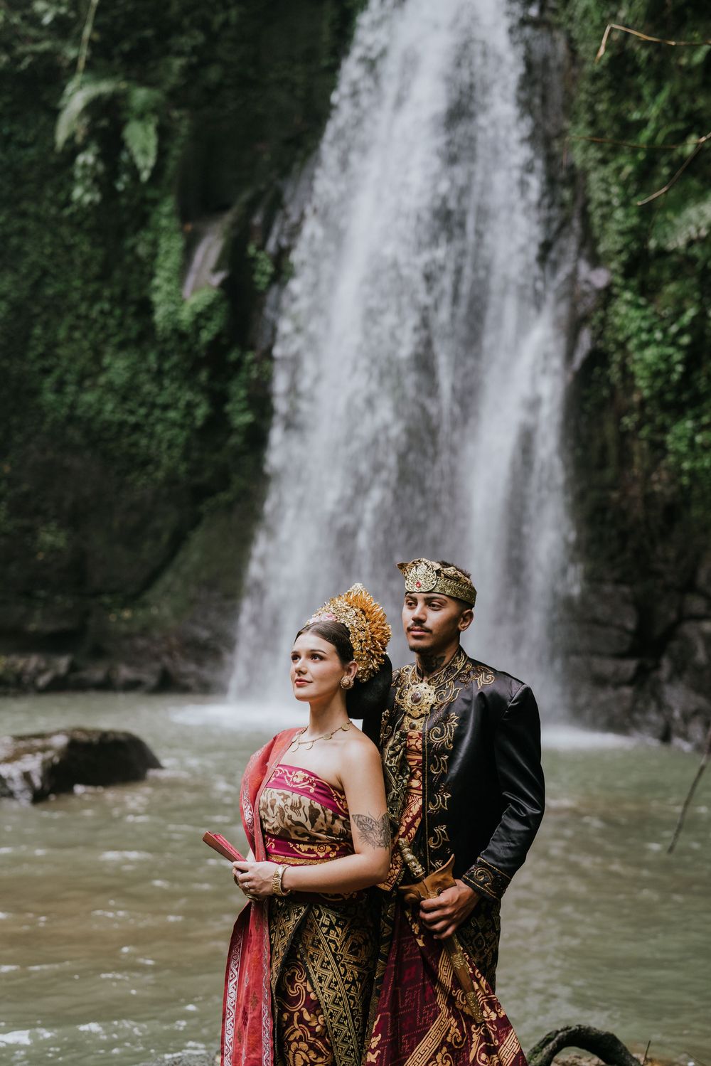 Prewedding photoshoot in Bali with Balinese costume at rice terrace and Ulu Petanu Waterfall