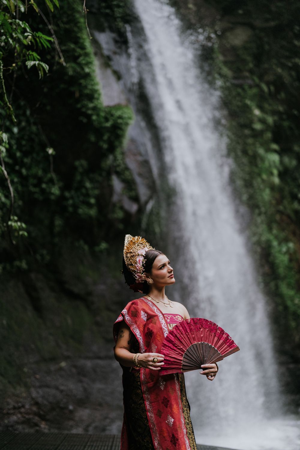 Prewedding photoshoot in Bali with Balinese costume at rice terrace and Ulu Petanu Waterfall