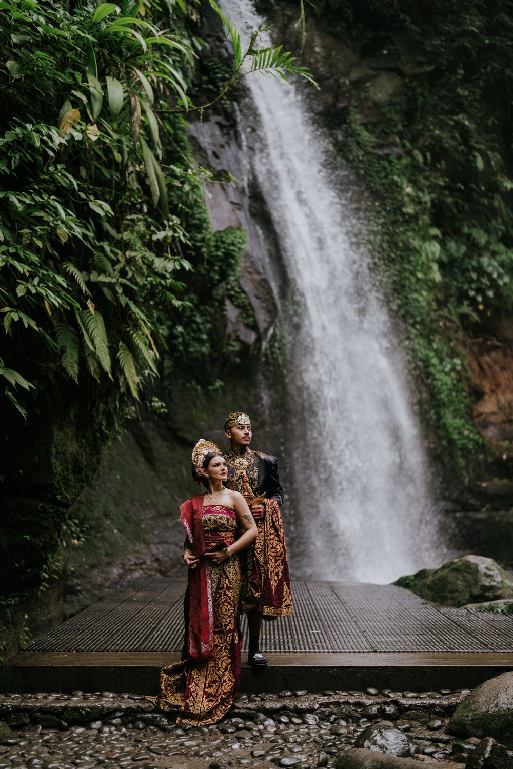 Prewedding photoshoot in Bali with Balinese costume at rice terrace and Ulu Petanu Waterfall