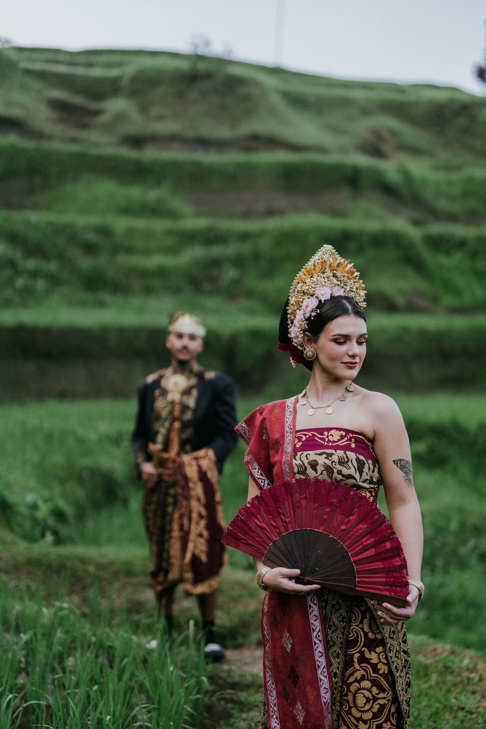 Prewedding photoshoot in Bali with Balinese costume at rice terrace and Ulu Petanu Waterfall