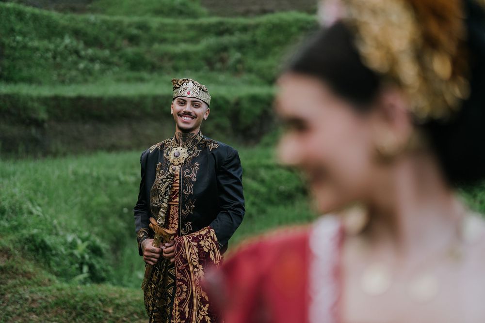 Prewedding photoshoot in Bali with Balinese costume at rice terrace and Ulu Petanu Waterfall