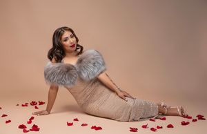 elegant woman birthday photoshoot studio with cake champagne and glam styling Sarasota