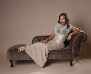 elegant woman birthday photoshoot studio with cake champagne and glam styling Sarasotaelegant woman birthday photoshoot studio with cake cha