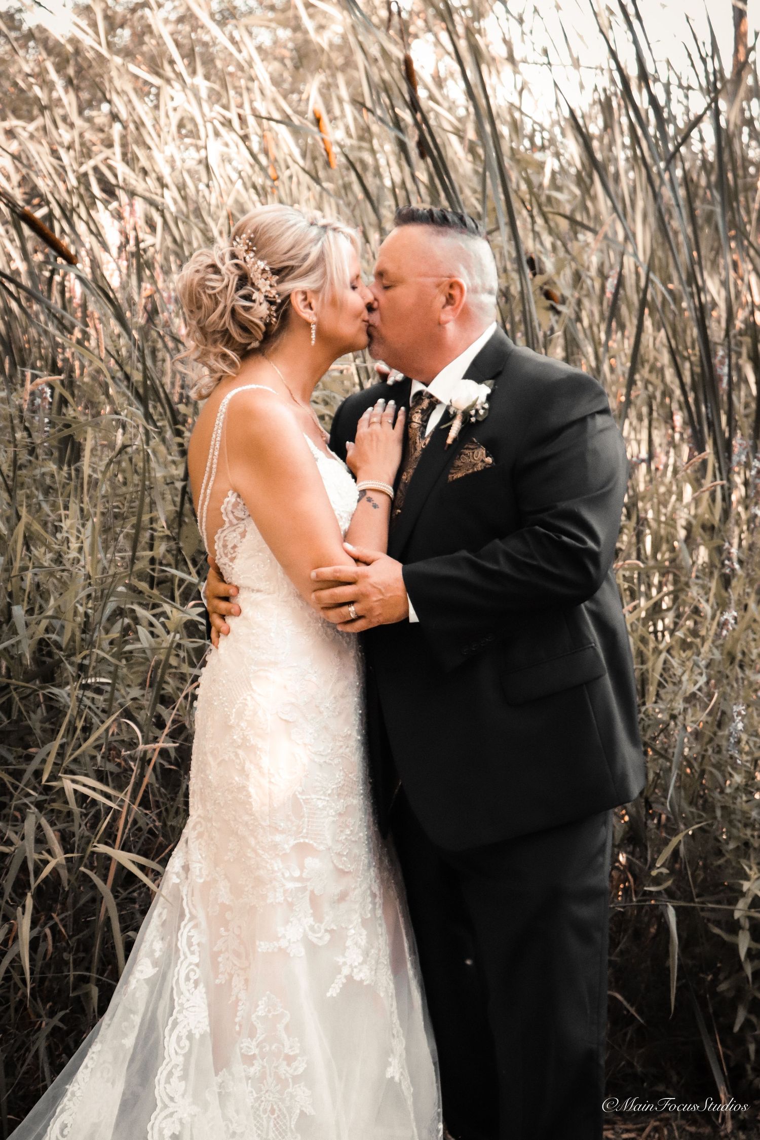 West Michigan wedding photography by Main Focus Studios. Authentic moments, timeless portraits, and heirloom albums you'll cherish.