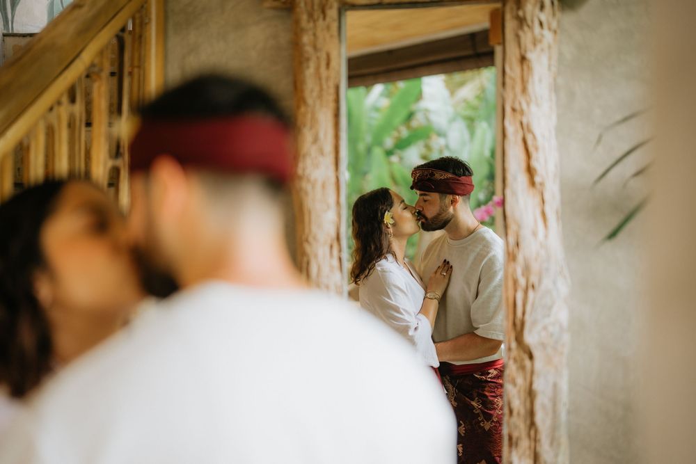 Romantic couple photoshoot with traditional Balinese architecture background