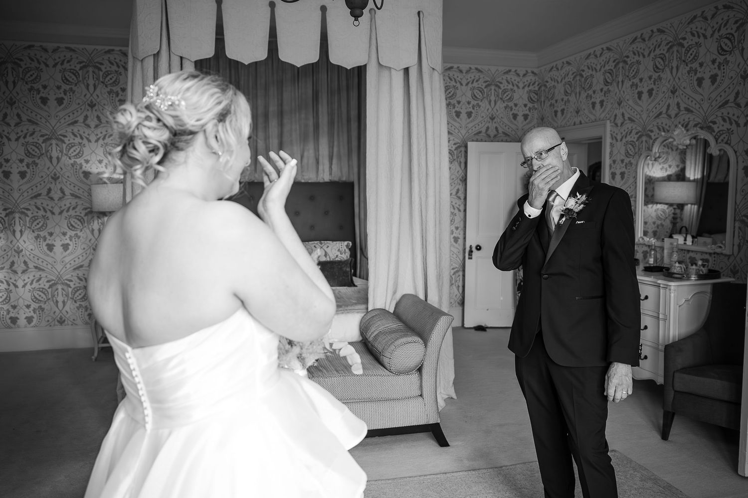 Father of the bride emotional first look in the Honeymoon Suite at Hodsock Priory.