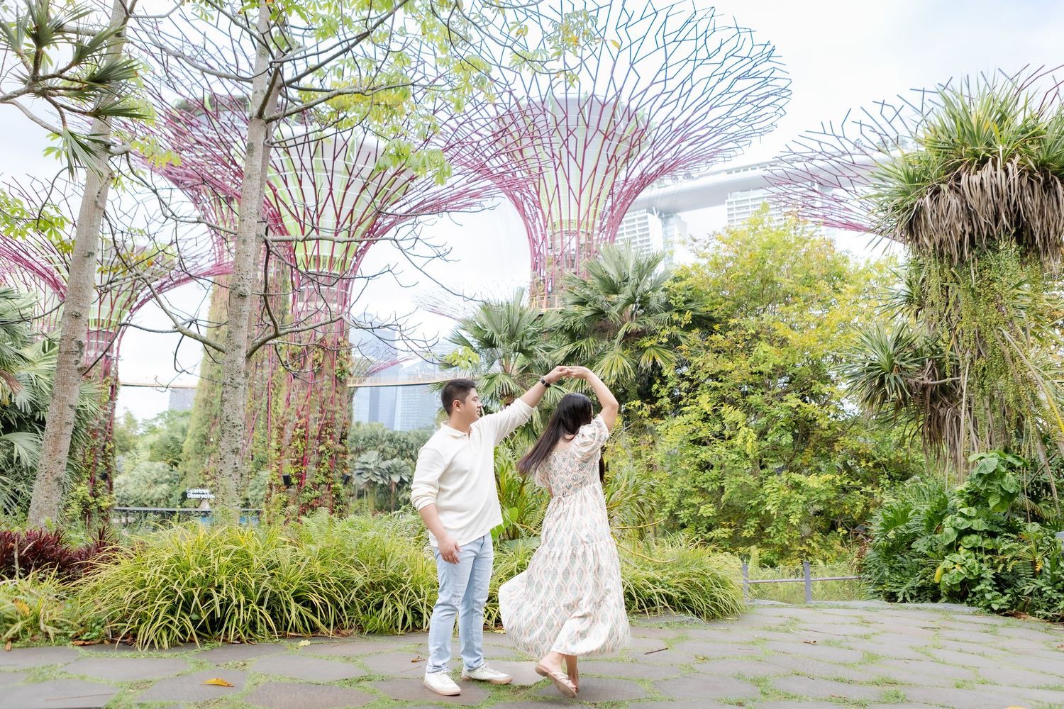 sunrise pre-wedding photos of filipino couple in singapore Gardens by the bay with Supertrees in the background