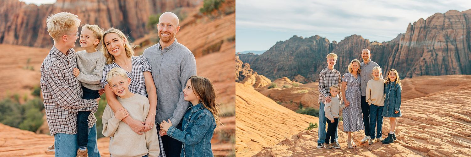 Group walking together on red sandstone cliffs with dramatic desert landscape in background.