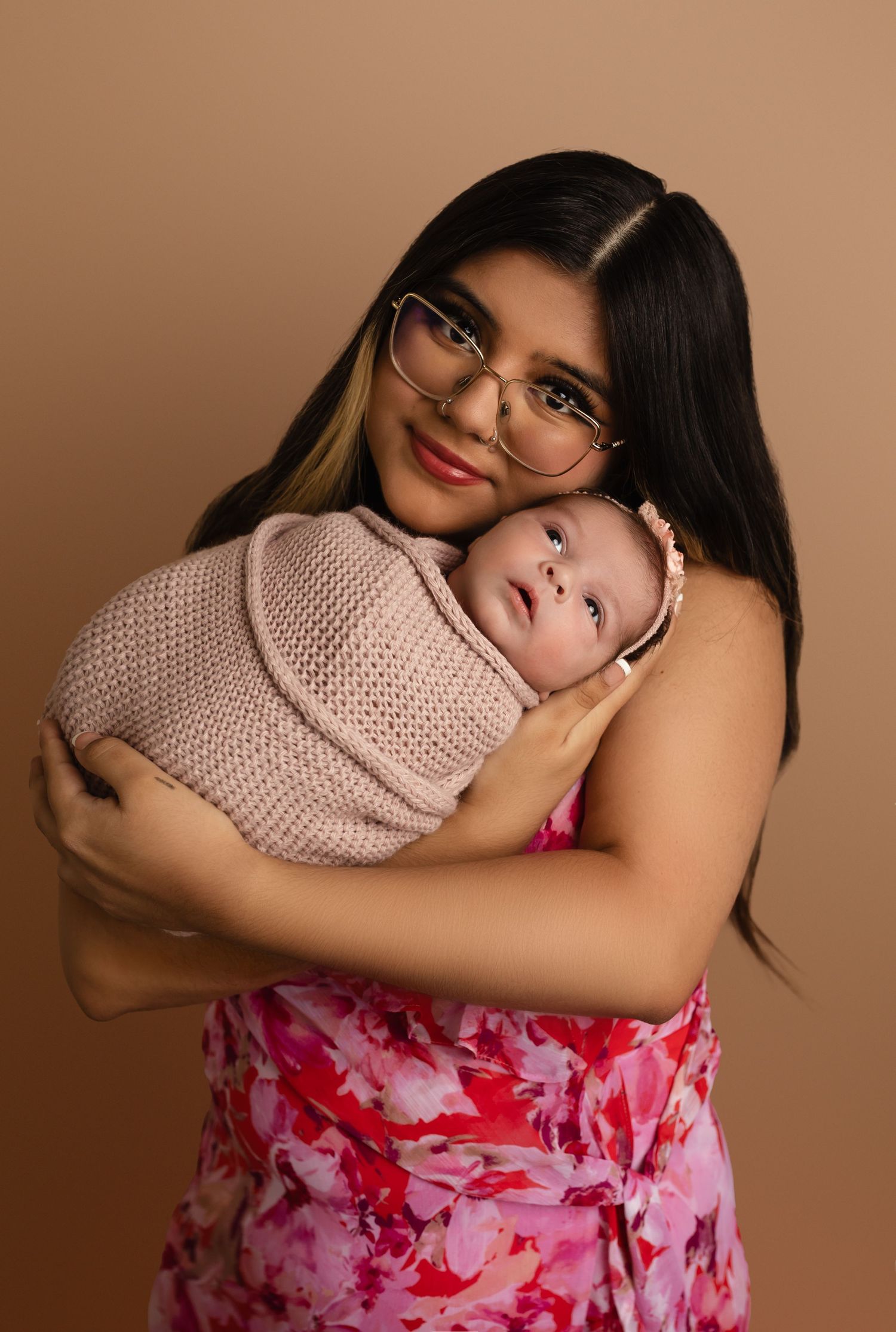 Charlottesville photographer, newborn, family, baby, maternity, mom holding awake newborn daughter, both in pink