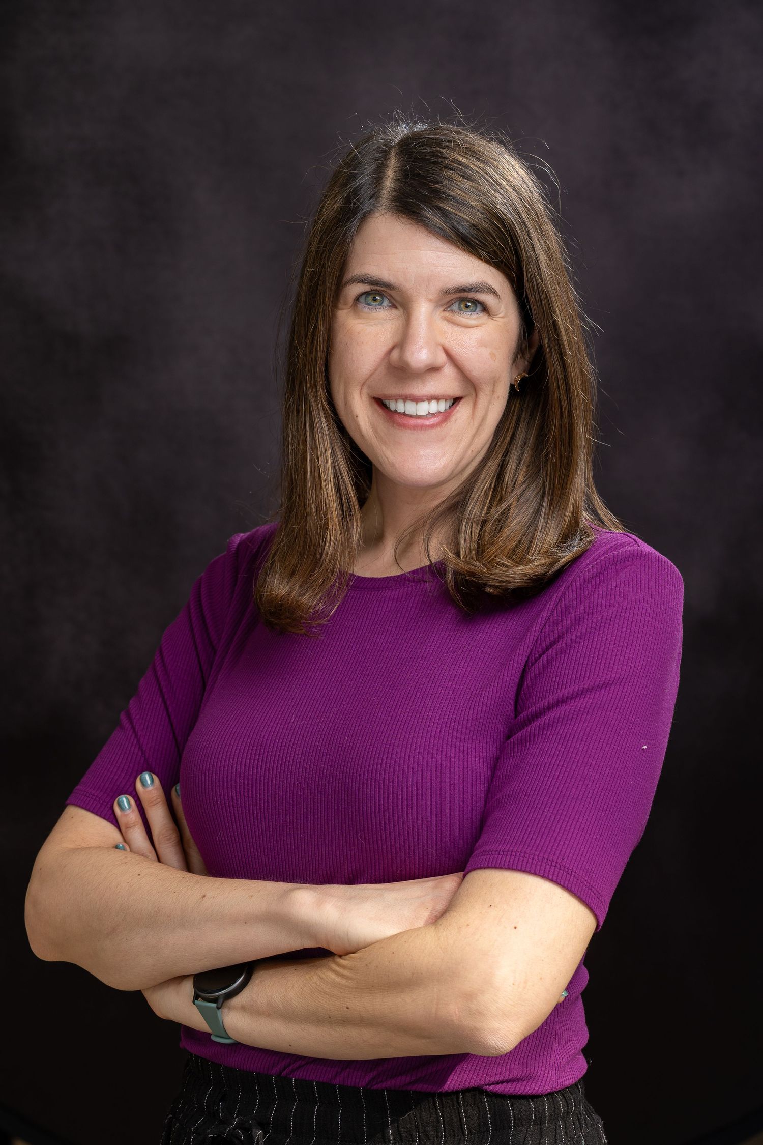 Professional headshot series showing a person in a purple top against a dark background with warm expressions.