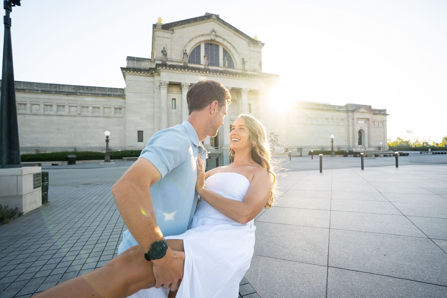 A romantic couple shares intimate kisses at sunset, creating a dreamy silhouetted sequence against a warm glowing sky.