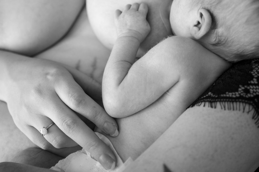 Mother holding newborn baby