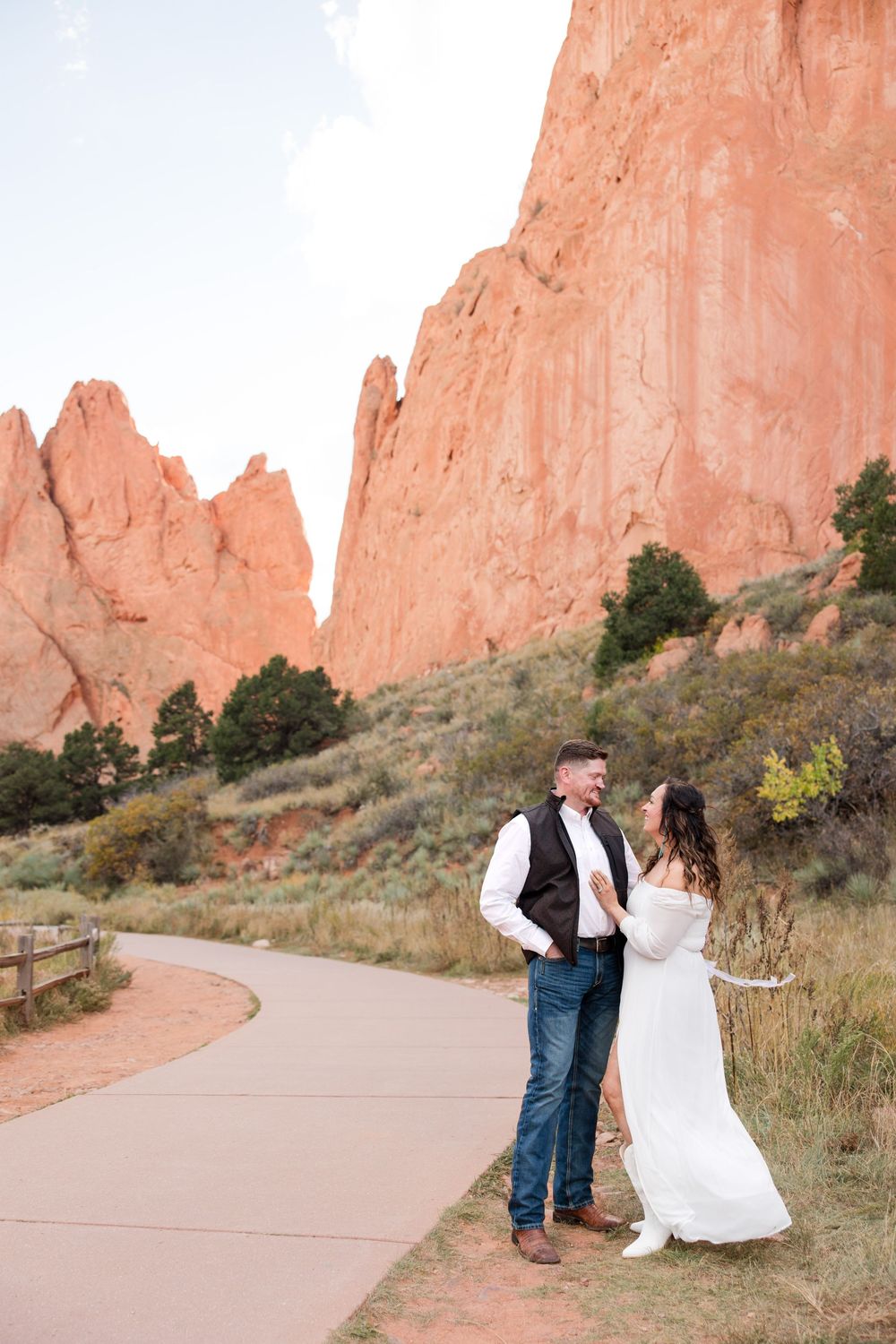 A winding path leads through red rock formations at Garden of the Gods park in Colorado Springs.