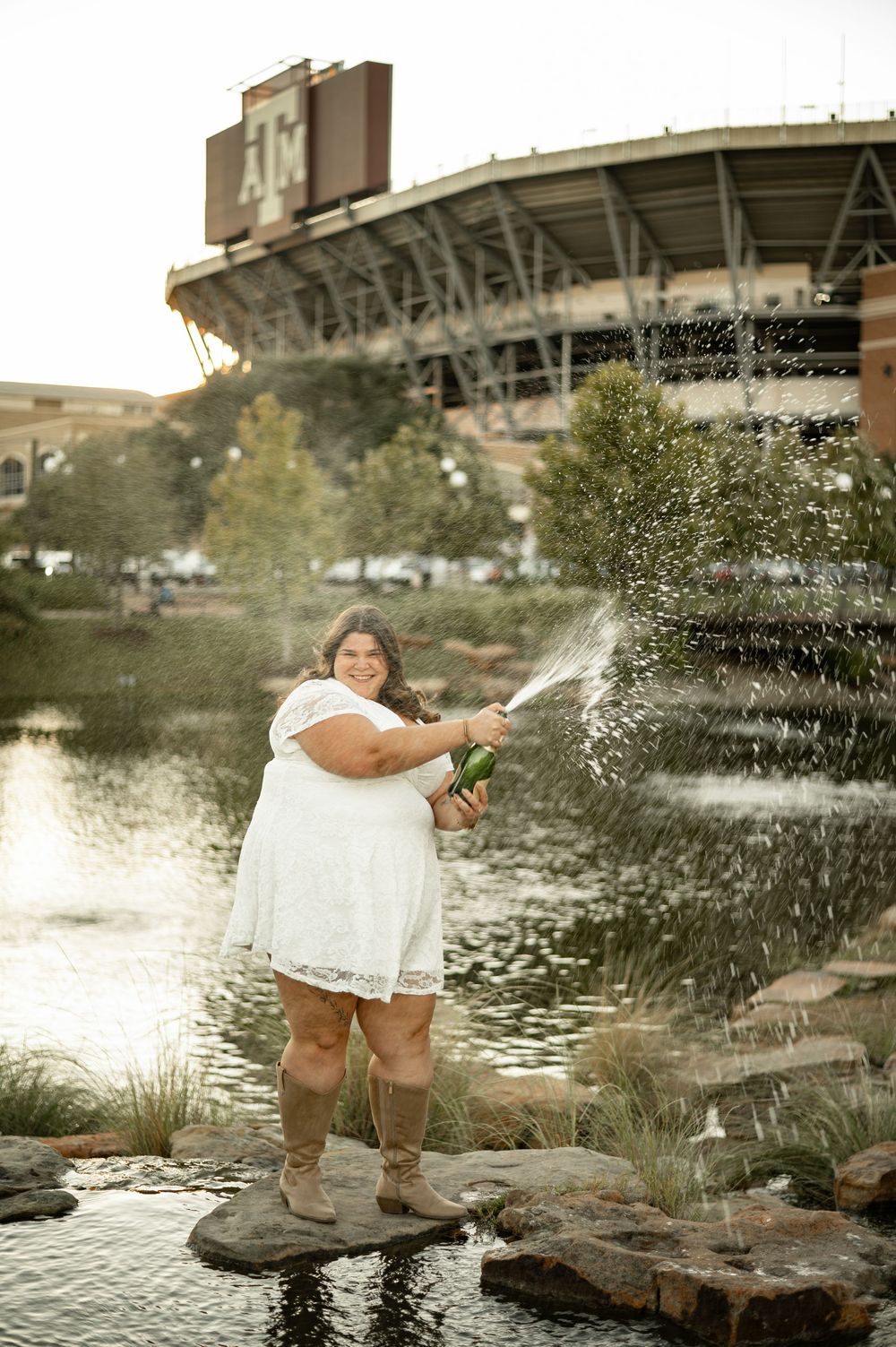 Series of splashing water photos shows playful moments by a pond in an urban setting.