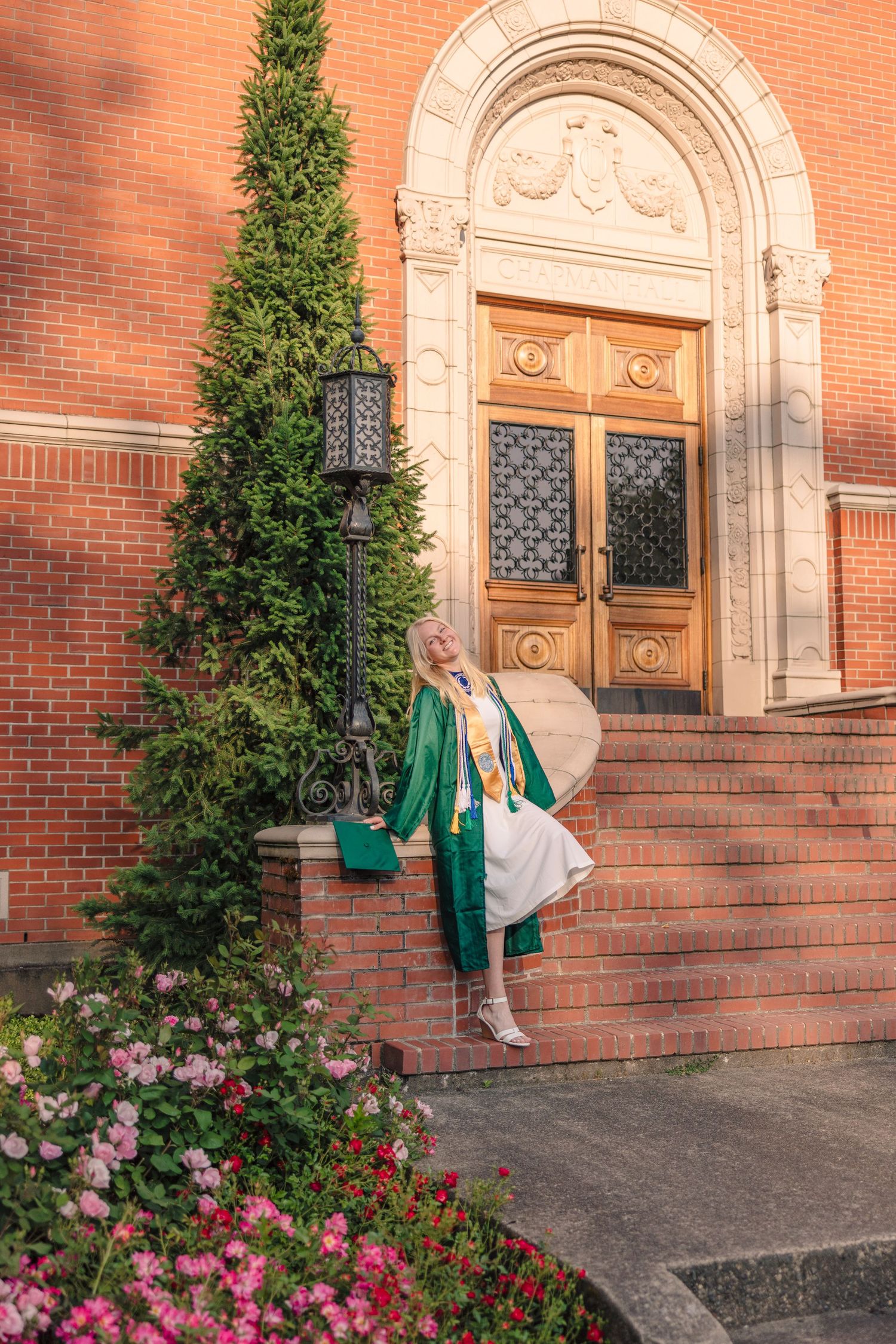 Historic brick building entrance with ornate architecture and green accents.