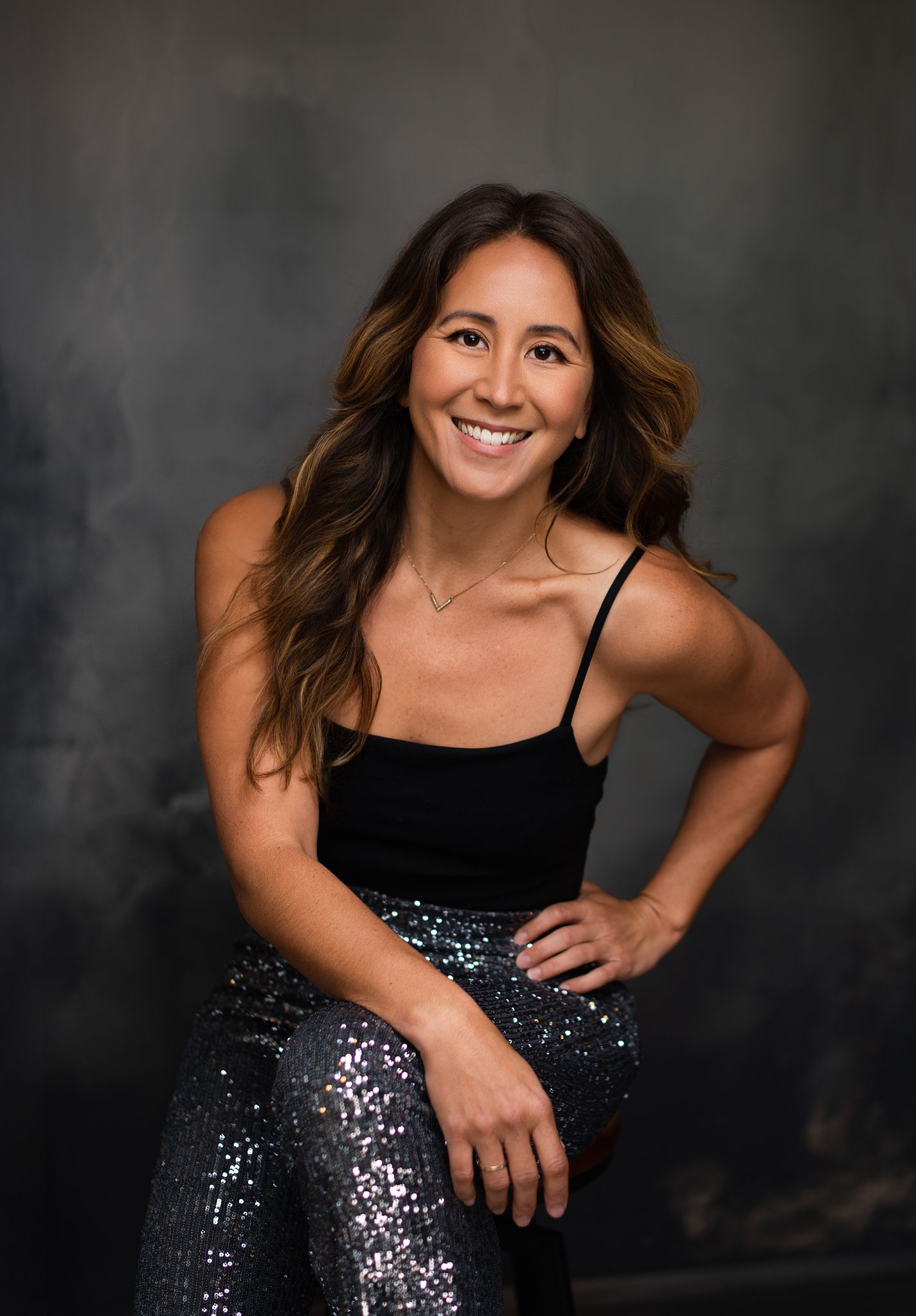 Editorial portrait of a smiling woman created by Yulia Ordaz in Seattle studio