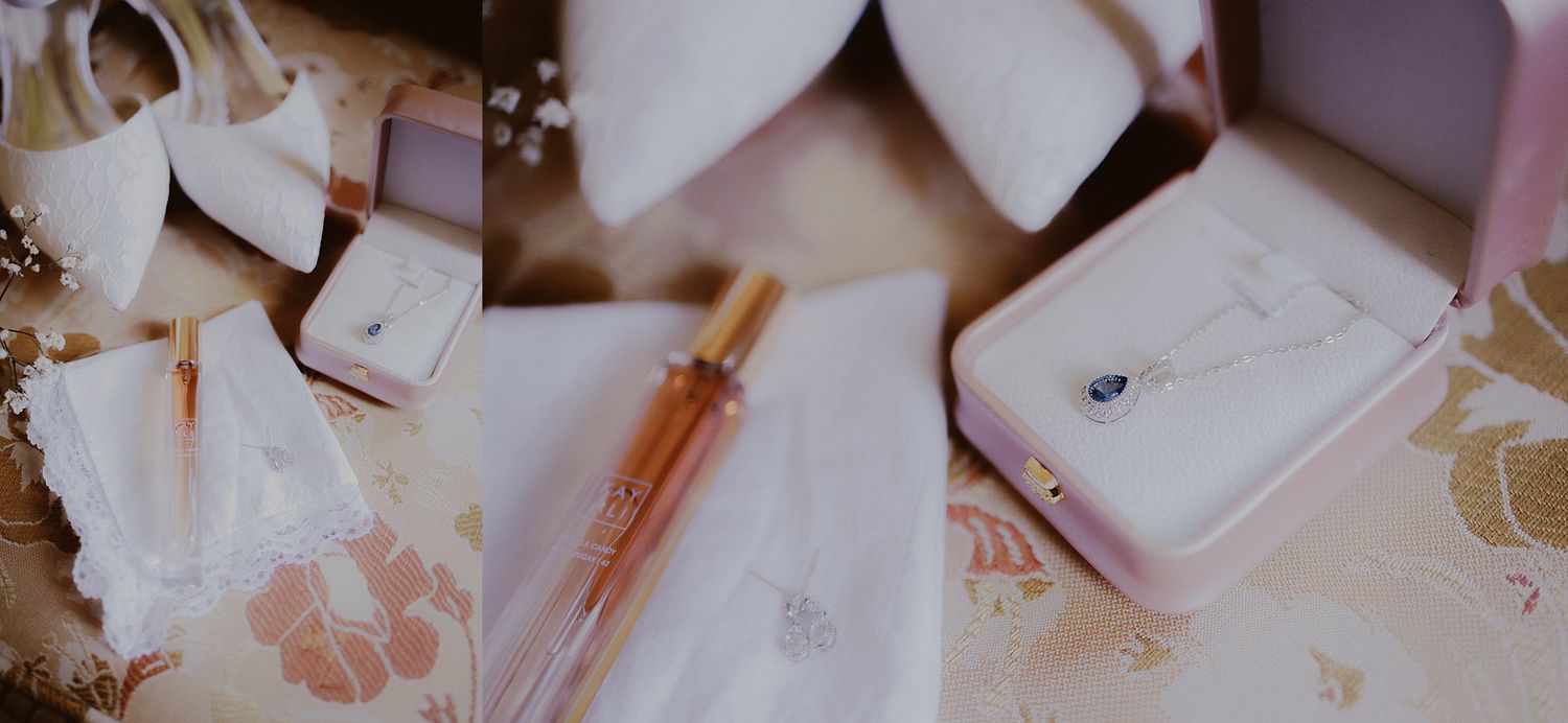 A close-up shot of a pink and gold stationery set with pens, washi tape, and paper clips arranged artistically.