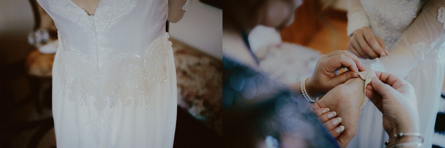 Close-up details of delicate beading and lace on a white wedding gown.
