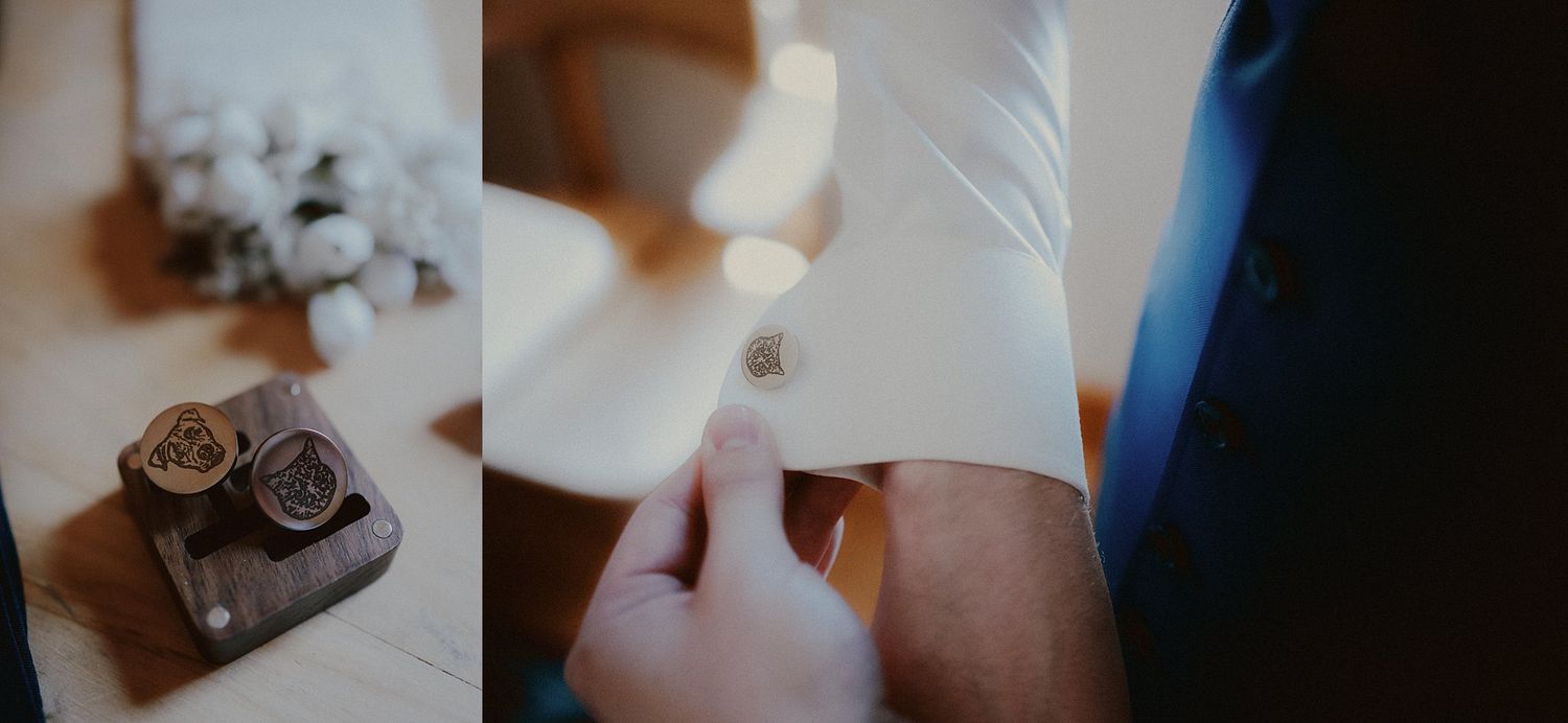 Wedding preparation details with dress shoes and accessories laid out.
