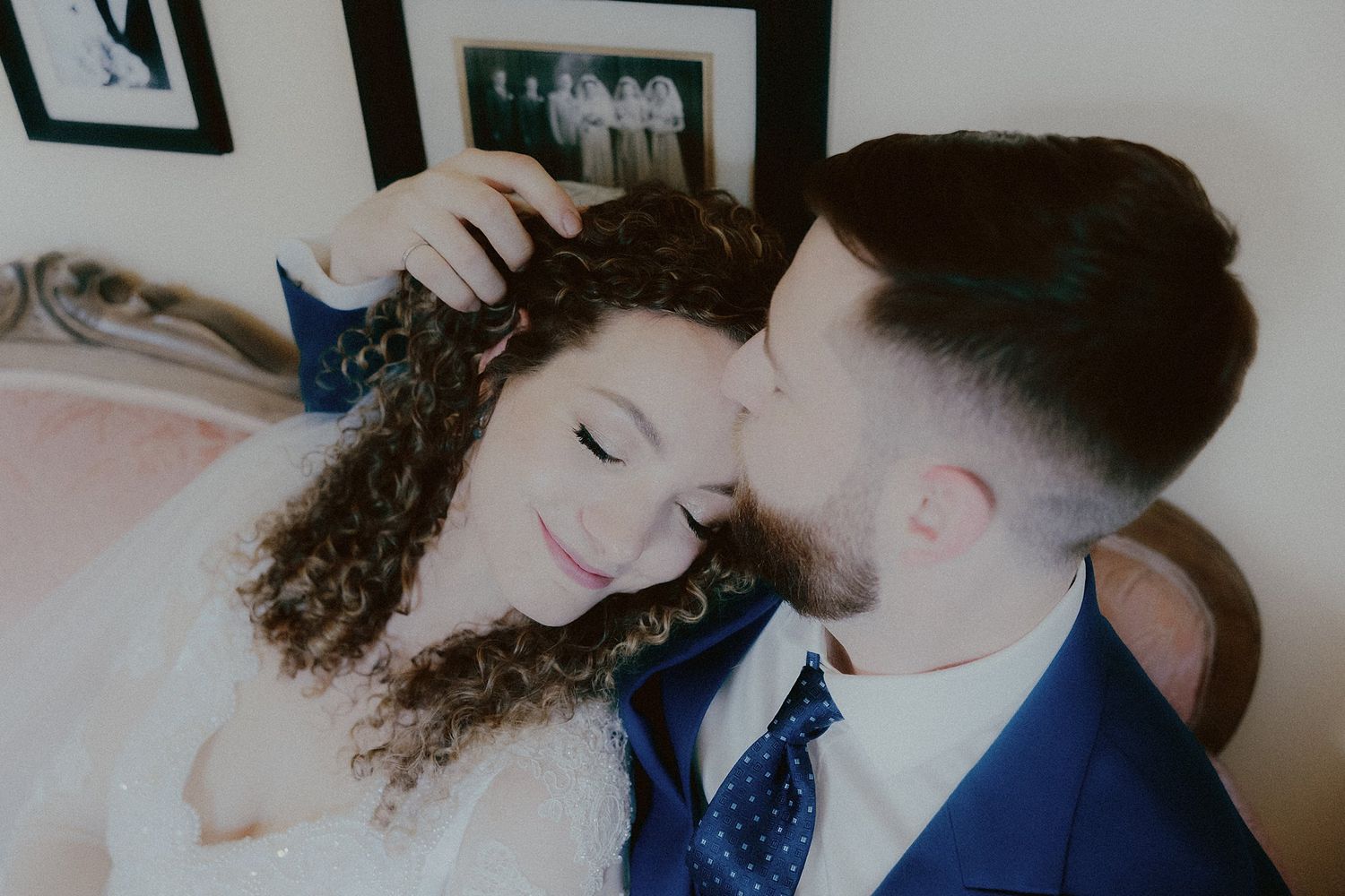 Tender moments shared between a couple in formal wedding attire.