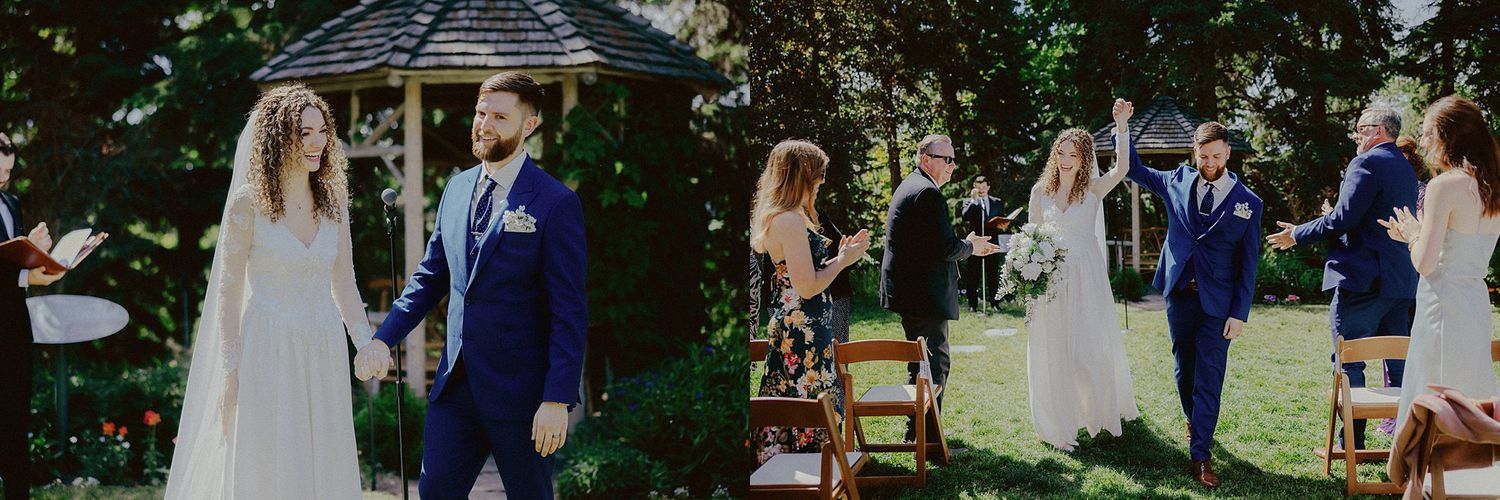 Outdoor wedding ceremony setup with wooden chairs and floral arrangements in a garden setting.