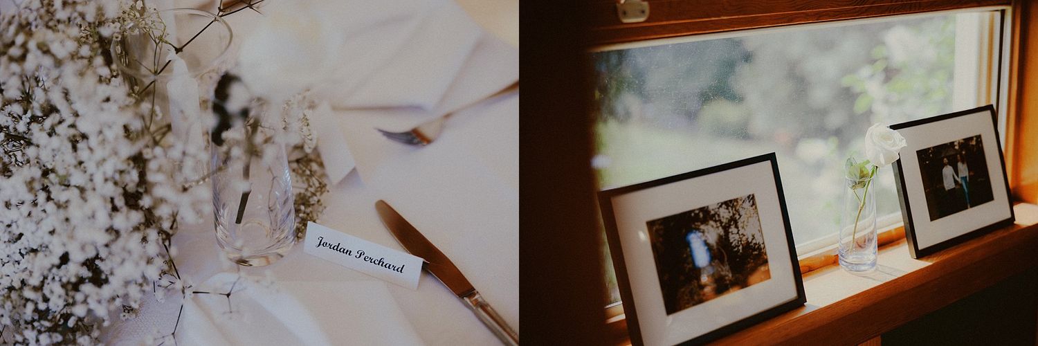 Wedding reception decor featuring rustic wooden beams and framed photographs on display.