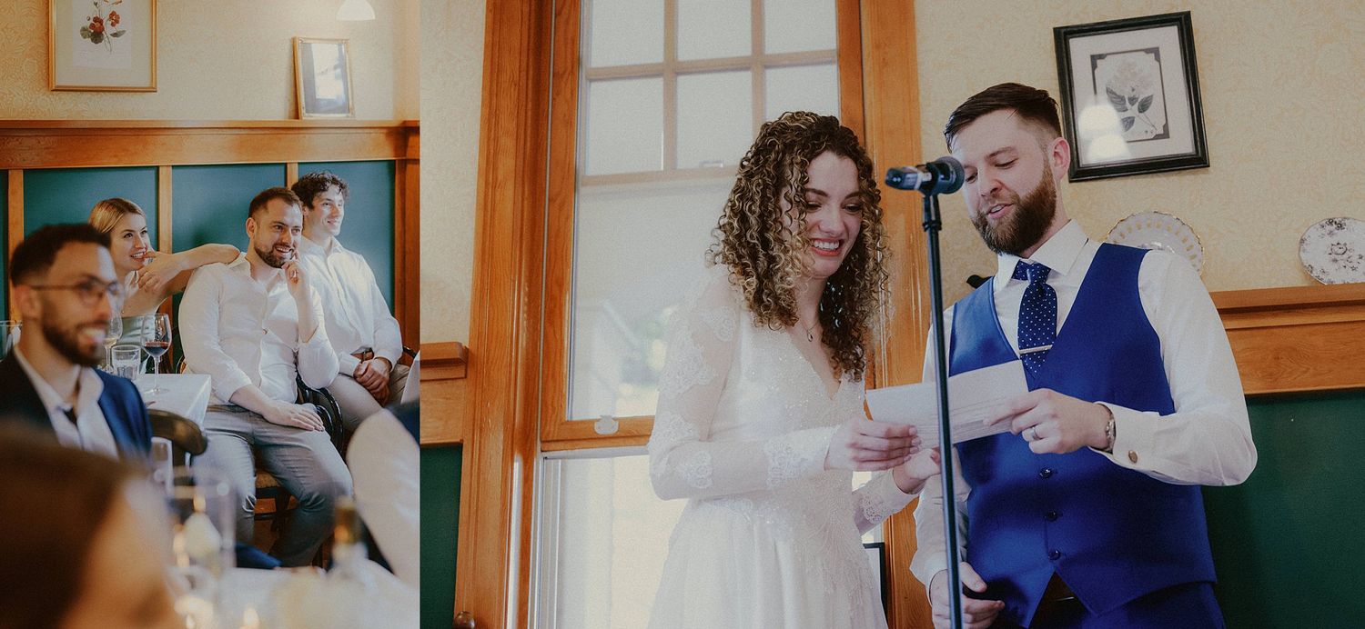 Wedding celebration inside a cozy wooden venue with natural light streaming through windows.