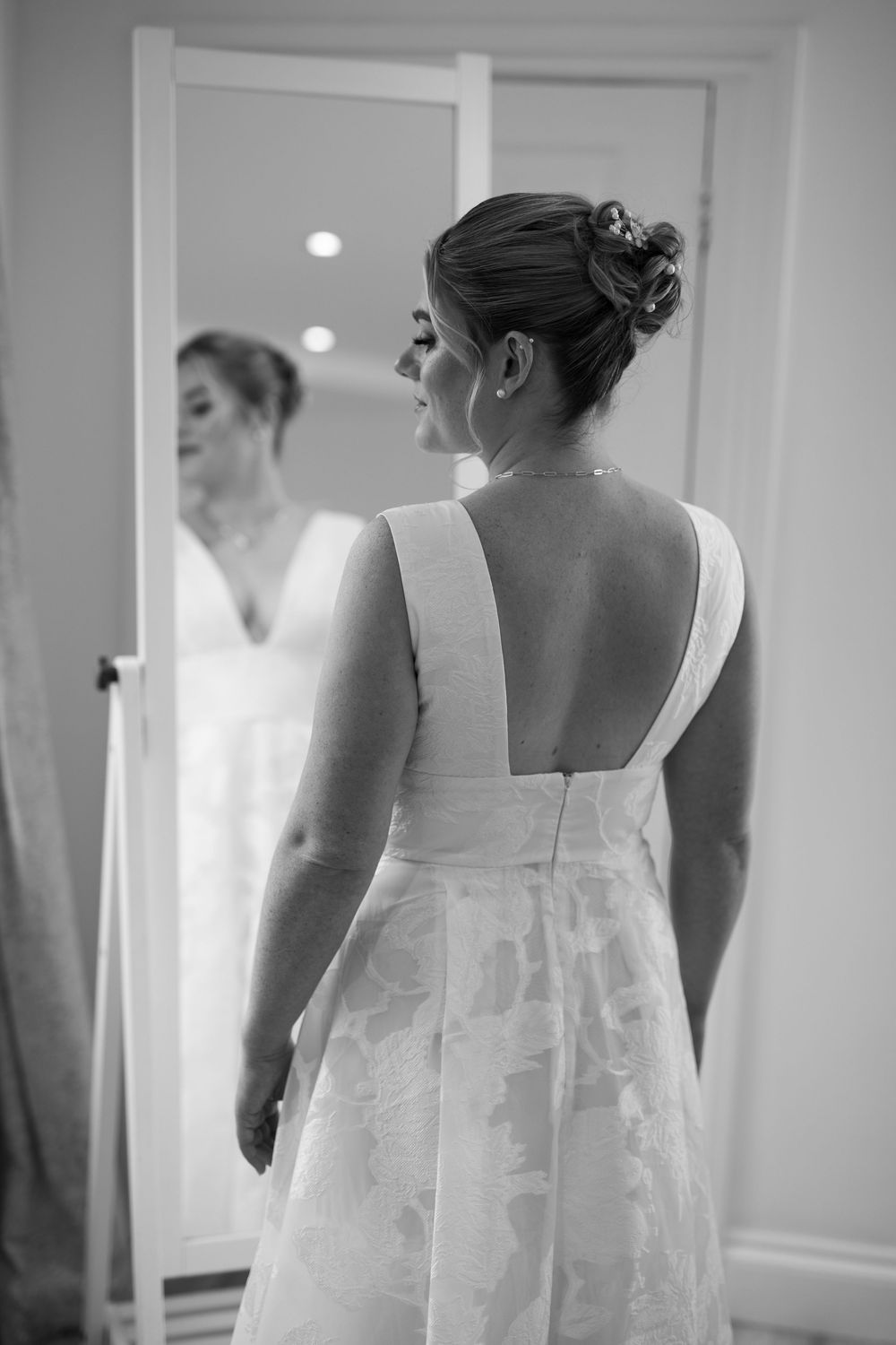 Series of black and white photos showing bridesmaids in white dresses from behind.