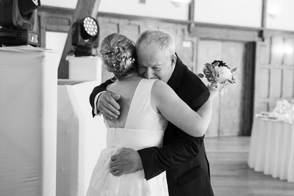 Black and white photo series showing intimate dance poses between two people at what appears to be a wedding celebration.
